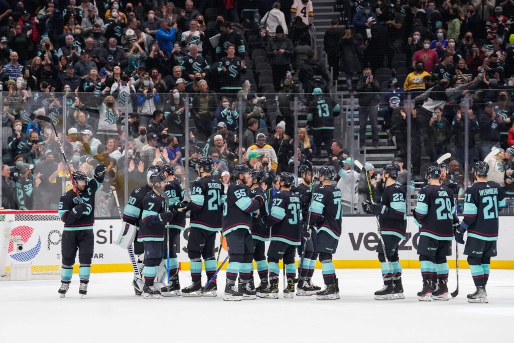 Seattle Kraken team celebrating win at arena